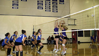 Orcas and Friday Harbor battle at the net in the second of three straight wins Sept. 23.