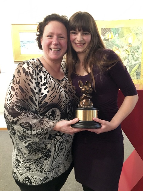 Aaimee Johnson and Stormy Hidlreth pose with The Bunny Award.