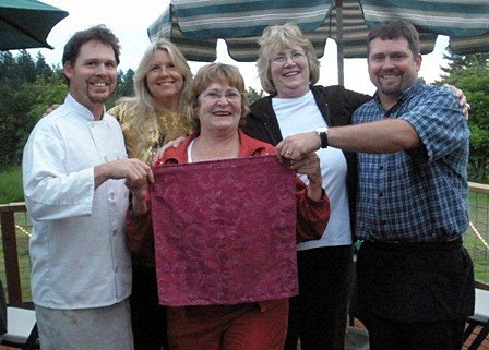 Matt (far left) and Ryan (far right) with ‘Nelson the Napkin’ and his friends who took around the world.
