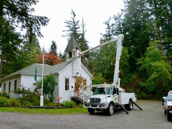 OPALCO lending a hand to remove the bell.