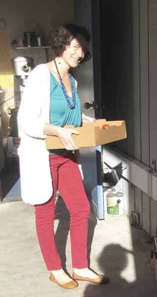 Charly Robinson delivering fresh garlic