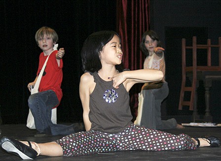 Paris Wilson (in front) rehearsing with Aiden and Ariel Vergan.