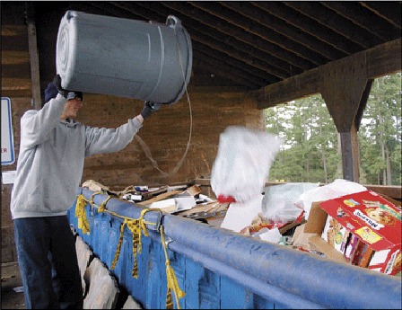 A local man recycling at the San Juan Island transfer station.