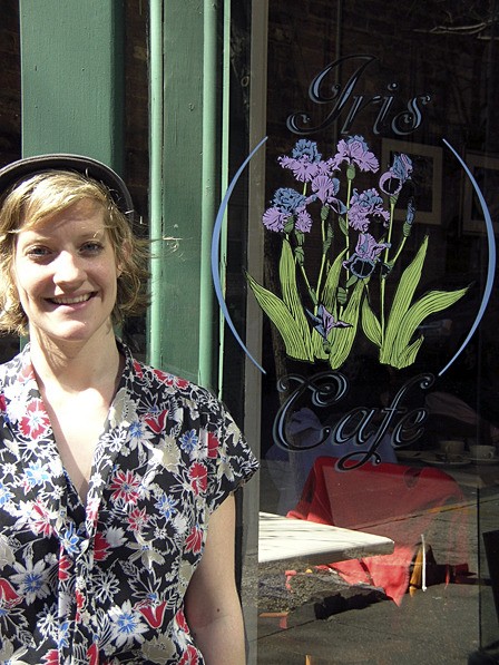 Rachel Graville at the door of her new business in New York.