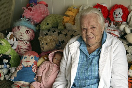 Maurine Taylor with her doll collection.