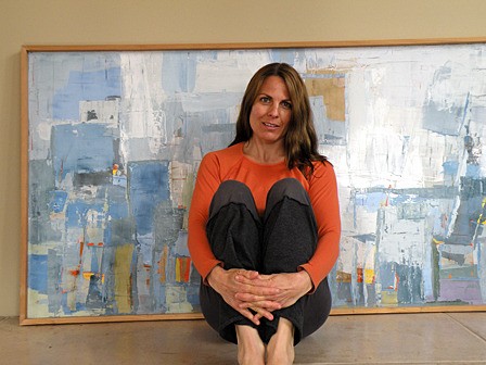 Deborah Jones with one of her paintings.