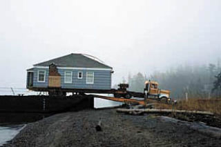 Photographer Dennis DeHart captured the house move from Kenmore to Orcas for a book on the house move.