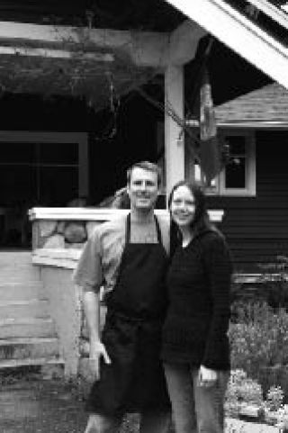 Charles Toxey and Jill Johnson in front of the Kangaroo House