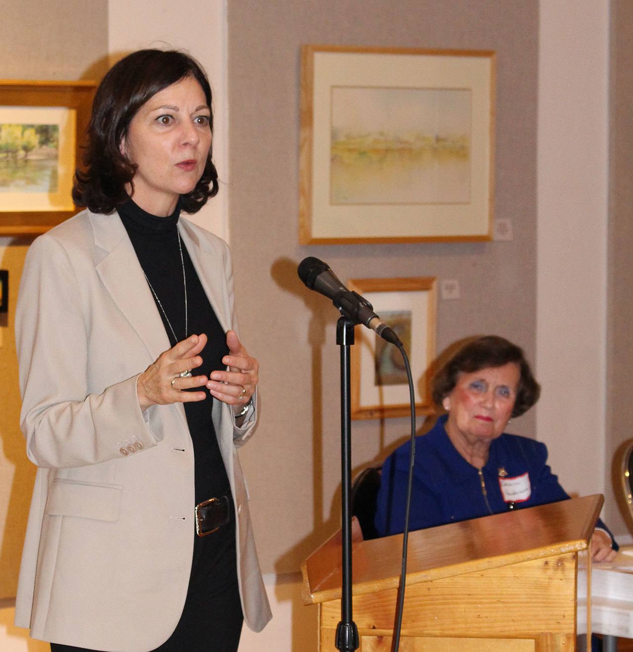 Colleen Smith Armstrong/staff photo                                Executive Director of Neighborhood Clinics Debra Gussin speaking at the meeting, with Catherine Henderson, OMF board president.