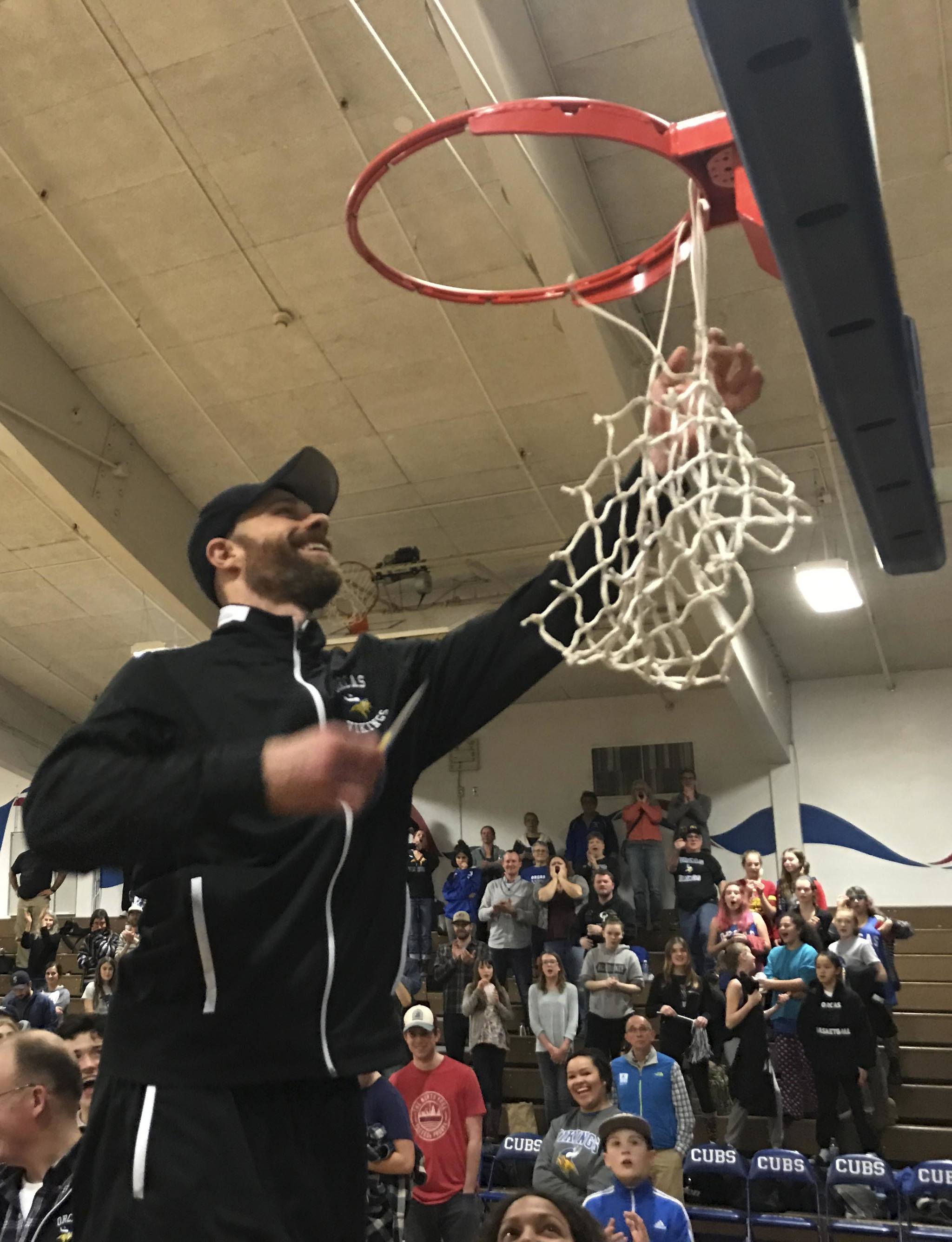 Viking boys are district champs; regional game is Feb. 25 | Photos