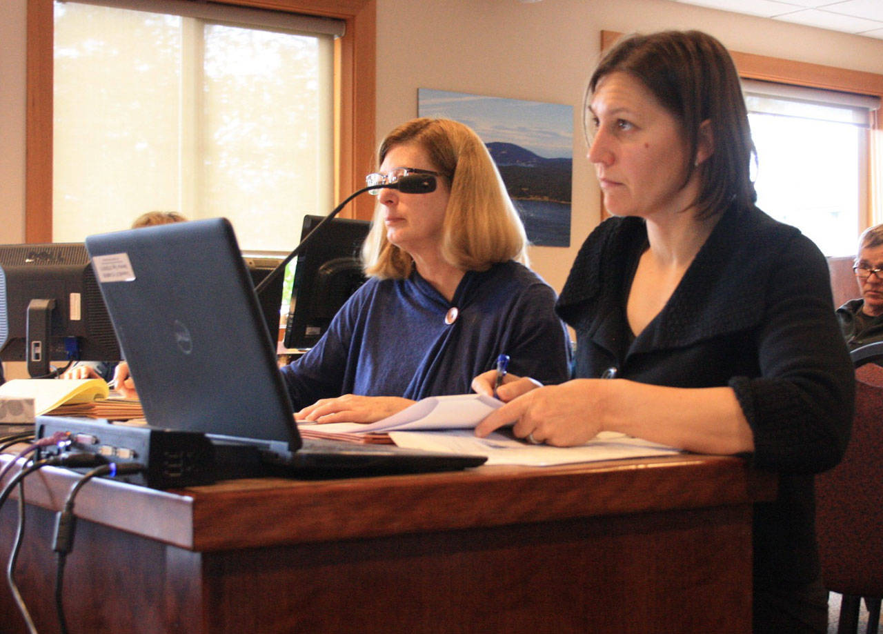 Staff photo/Hayley Day                                Erika Shook, director of San Juan County Community Development, and Linda Kuller, planning manager, discuss the proposals for contractors to help with parts of the county’s comprehensive plan’s update.
