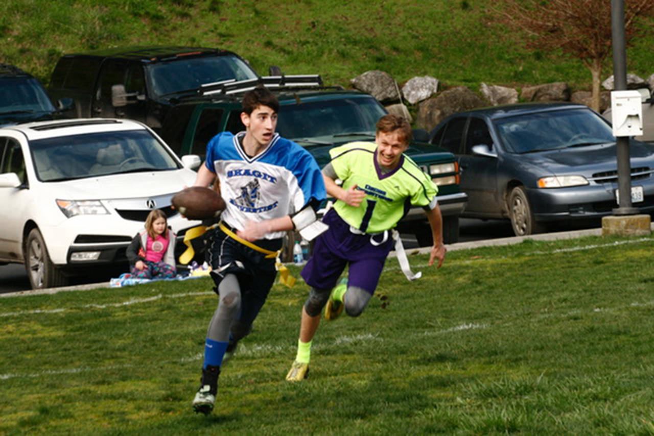 Skyler Gregg flushes the Skagit quarterback out of bounds