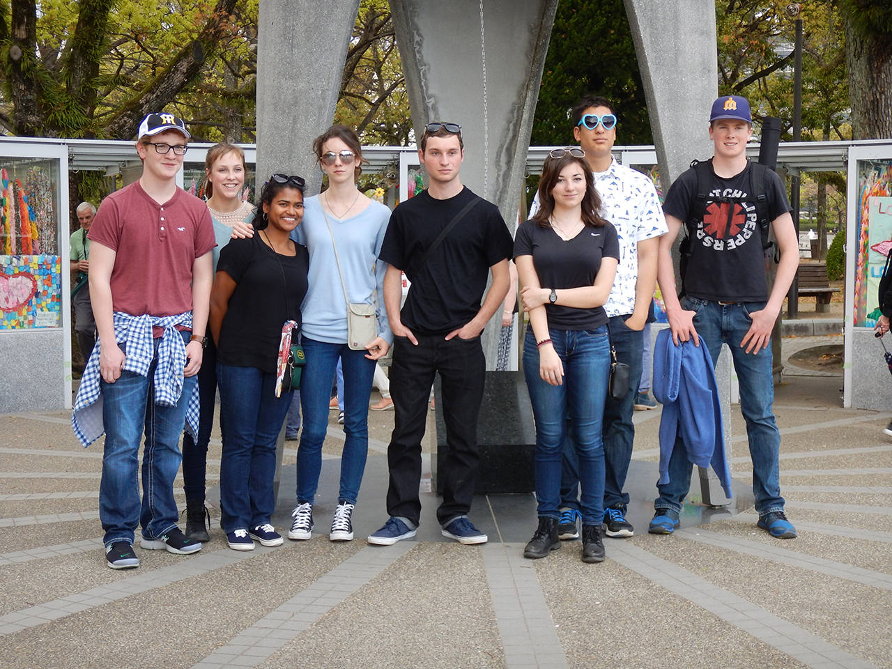 Left to right: McCabe Webb, Anah-Kate Drahn, Ashi Bartolucci, Claire Roberson, Jonathan Doherty, Maria Schwartz, Michael Chesher, and Hayden Simpson in front of the Children’s Peace Monument, Hiroshima.