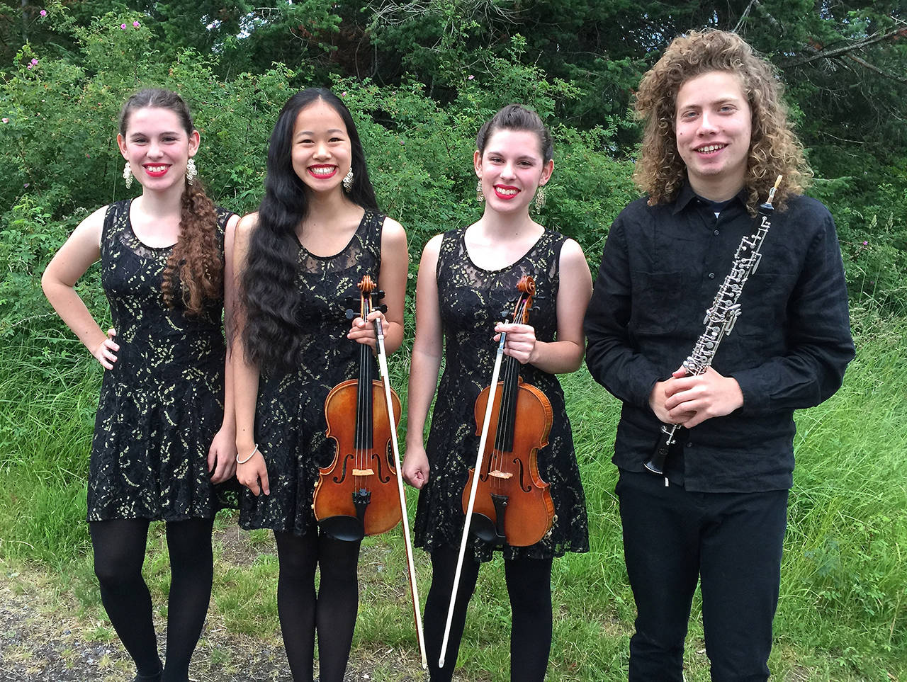 From left to right: Lisa Carter, Paris Wilson, Emy Carter and Tate Cohan before Martin Lund&rsquo;s One World concert at Orcas Center.