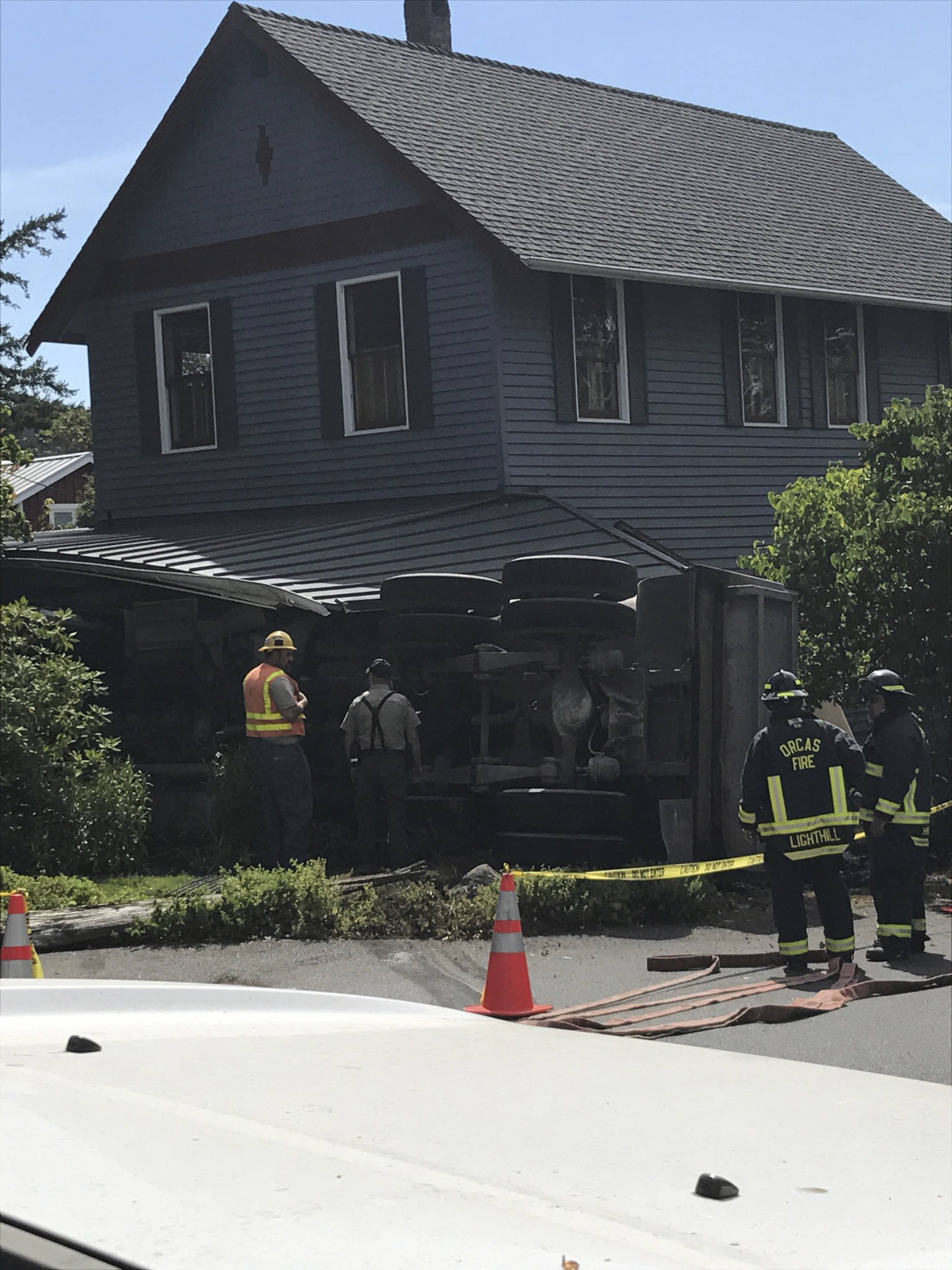 Dump truck crashes into house