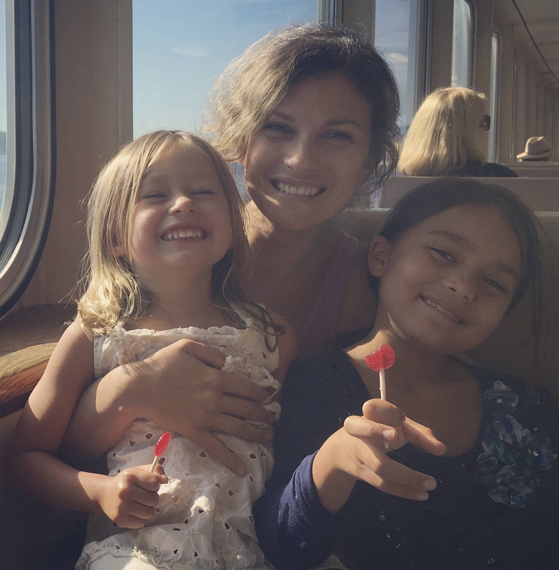 Alexandria Romero with her two girls arriving on Orcas.