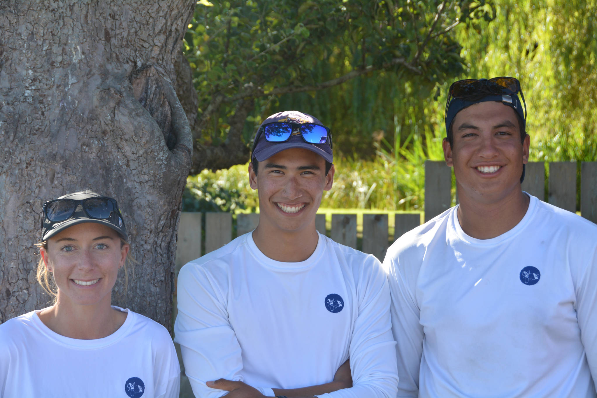 Hannah Tuson-Turner with Wylie Kau (left) and Michael Chesher.