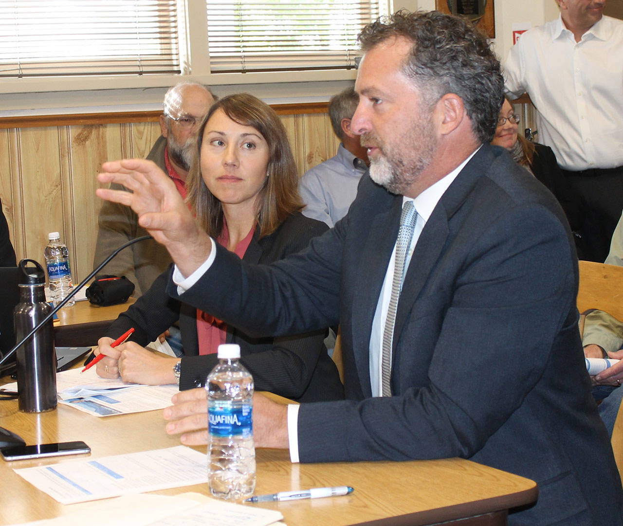 Staff photo/Hayley Day                                Sen. Kevin Ranker, D-Orcas, explains the summer’s disruptive sailing schedule to the Washington State Transportation Commission at the Town of Friday Harbor Council chambers on Sept. 19.