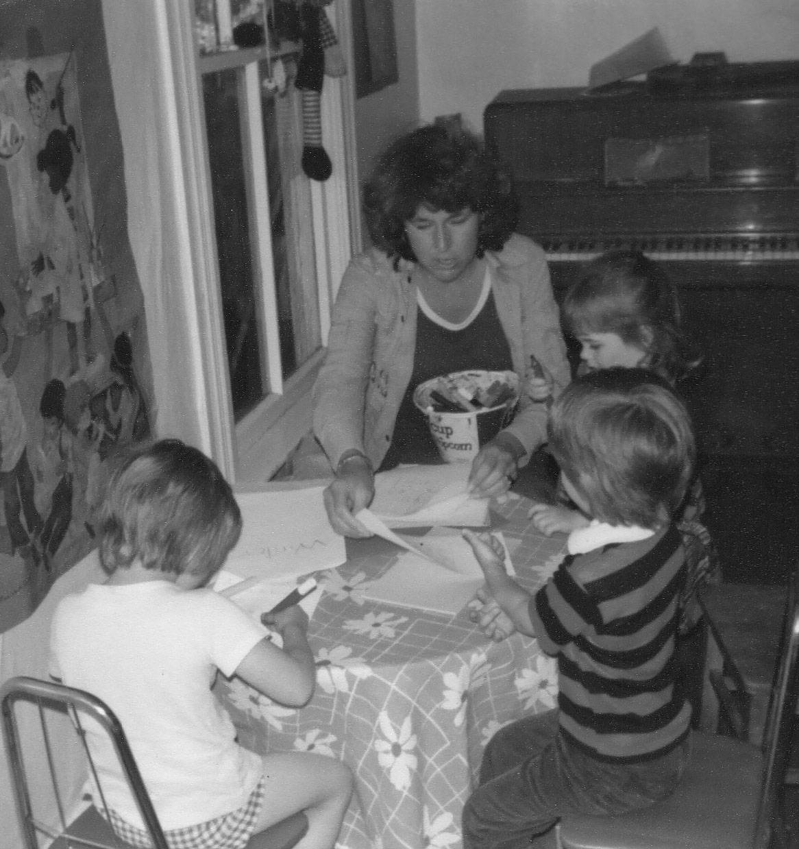Sandy Starr with students in the front room of the Lavender farmhouse, which today still houses the Children’s House Preschool.