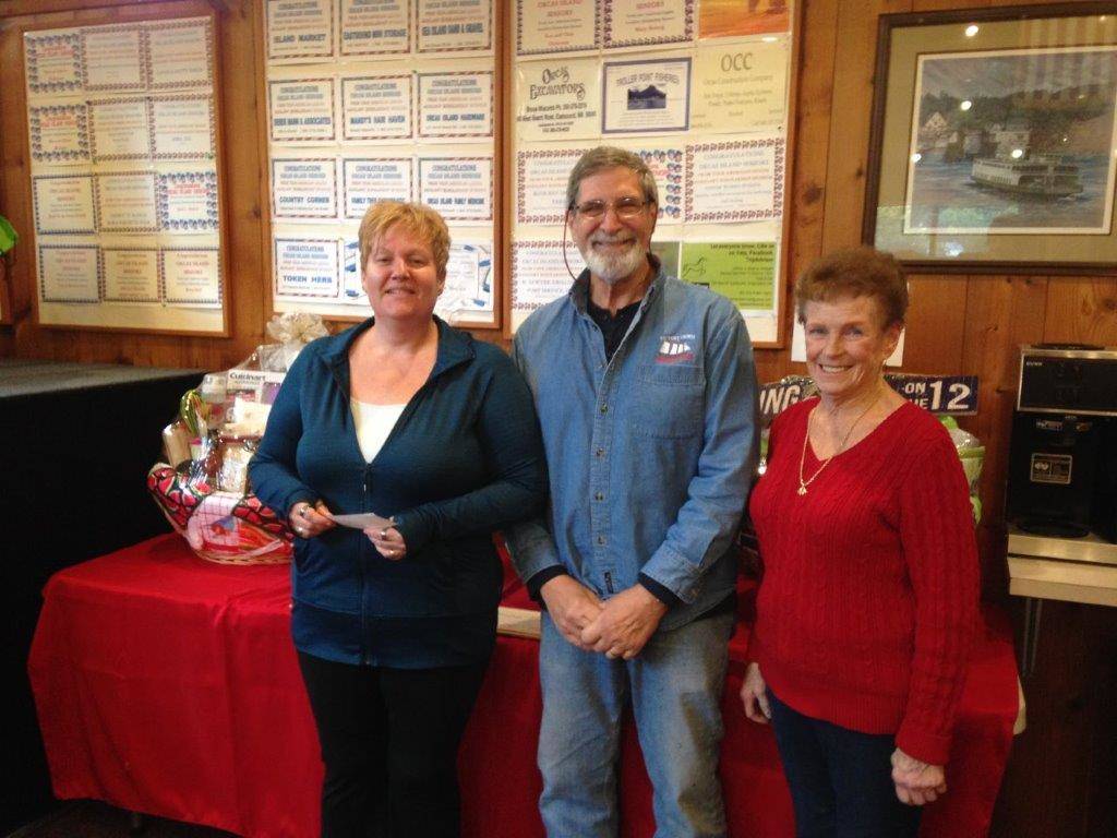 Contributed photo                                American Legion Auxiliary Treasurer Connie Haugen (left) and First Vice President Jan Cleveland (right) presenting a check to Jack Becker in the amount of $800 for the Mercy Flight fuel fund on Orcas.