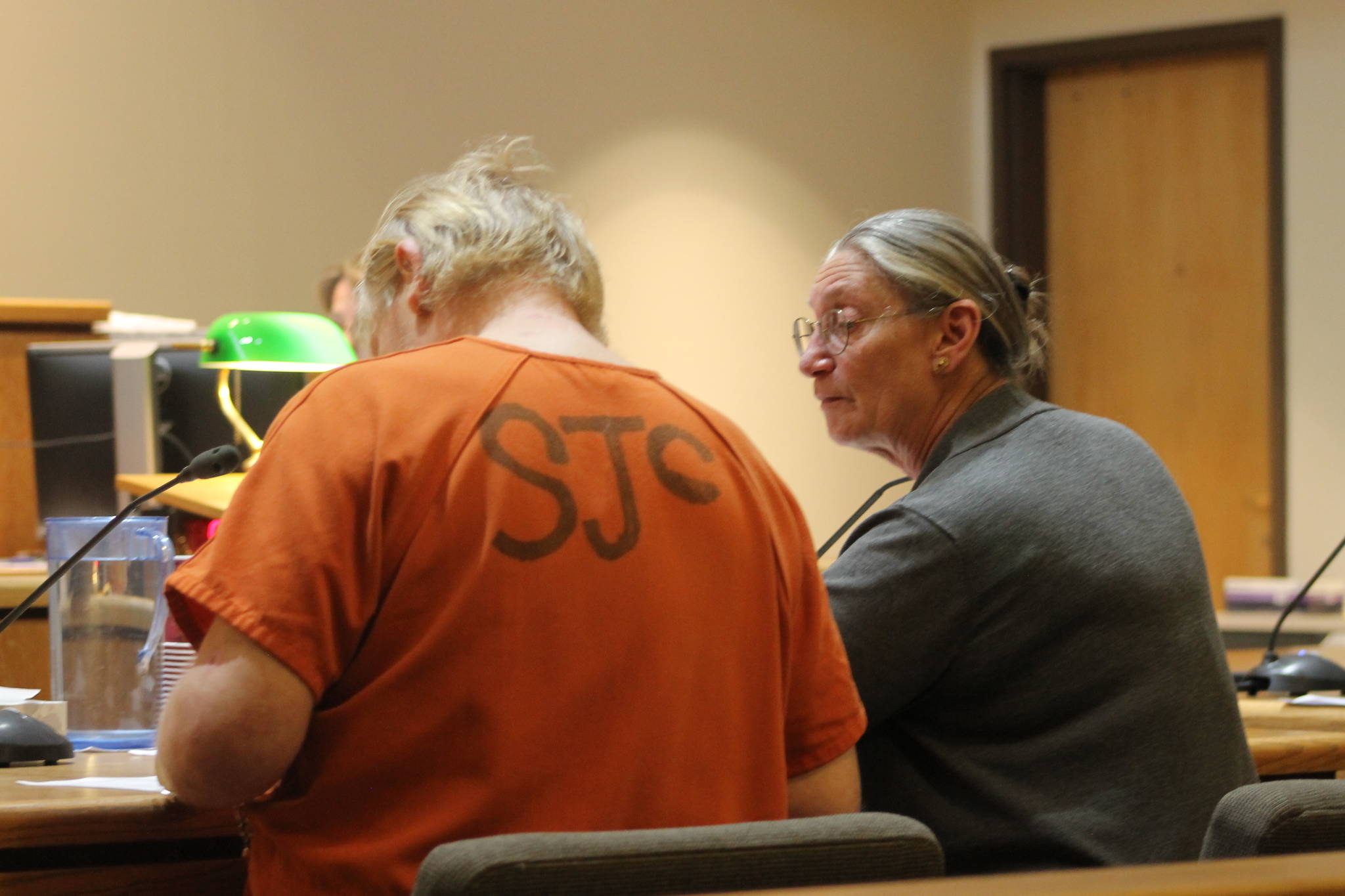 Heather Spaulding/staff photo                                Eric Kulp with public defender Colleen Kenimond.