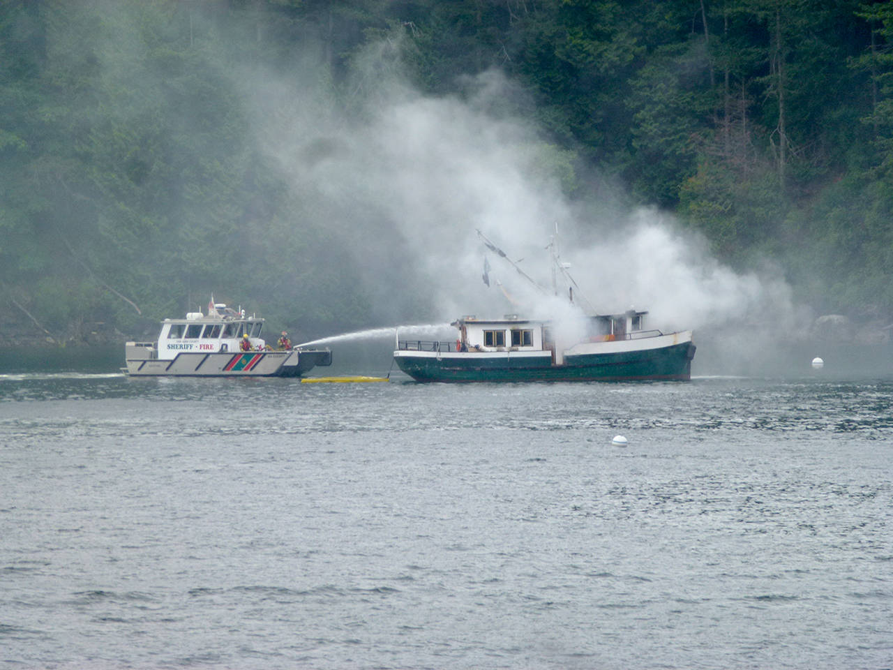 Multi-agency response to Judd Cove boat fire