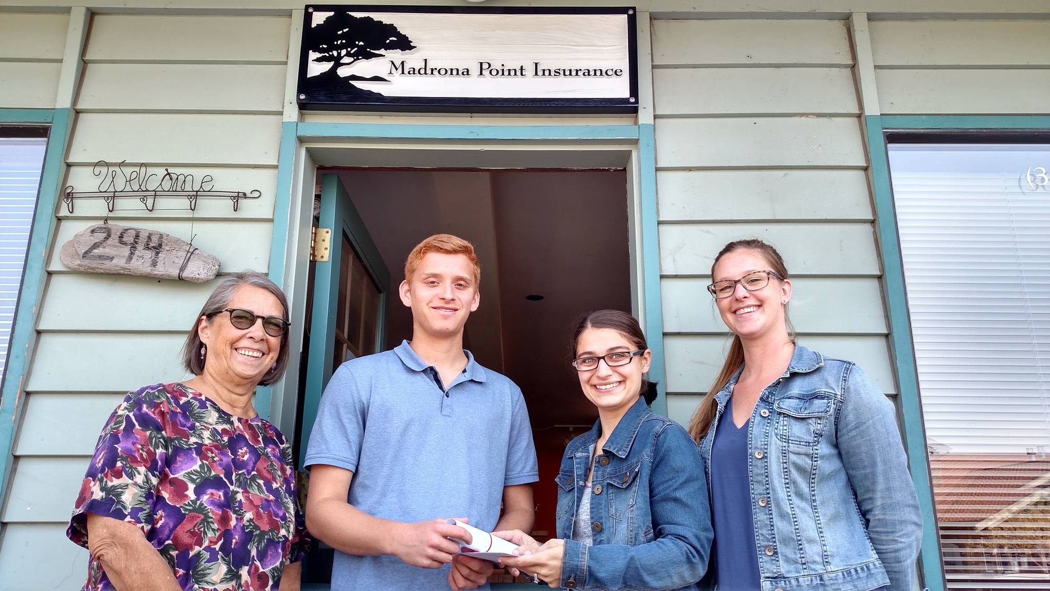 Ethan White with the staff of Madrona Point Insurance, left to right: Judi Madan, Kami Griffin and Alexis Beckley.&lt;h2&gt;                                &lt;/h2&gt;