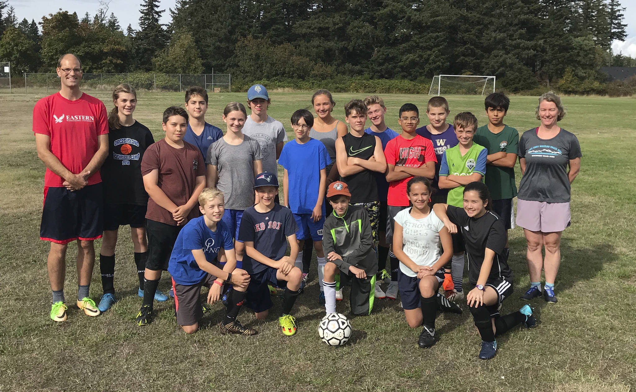 Back row, left to right: Coach Phil Carter, Bethany Carter, Diego Lago, Lael Watson, Celia Groeninger, Elijah Giampietro, Paxton White, Kashi Campbell and coach Kate Long. Middle row: Orion Meskew, Meriel Griffith, Theo Vaccarella, Tommy Anderson-Cleveland, Pedro Guerra and Ethan Moss. Front row: Sam Sutton, Jefferson Freeman, Isaac Moss, Milana Schneider and Meg Waldron.