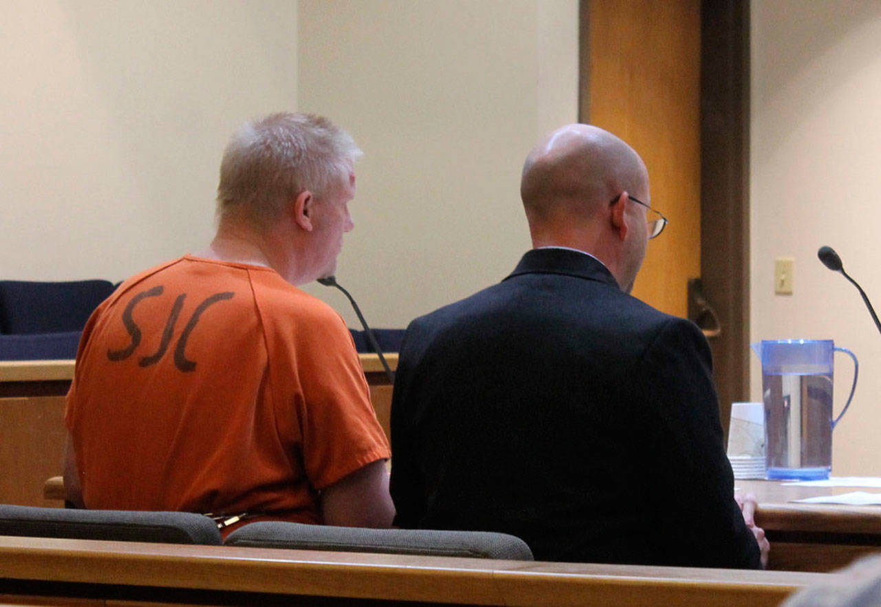 Staff photo/ Hayley Day                                Eric A. Kulp and his attorney in San Juan County Superior Court on Aug. 3.
