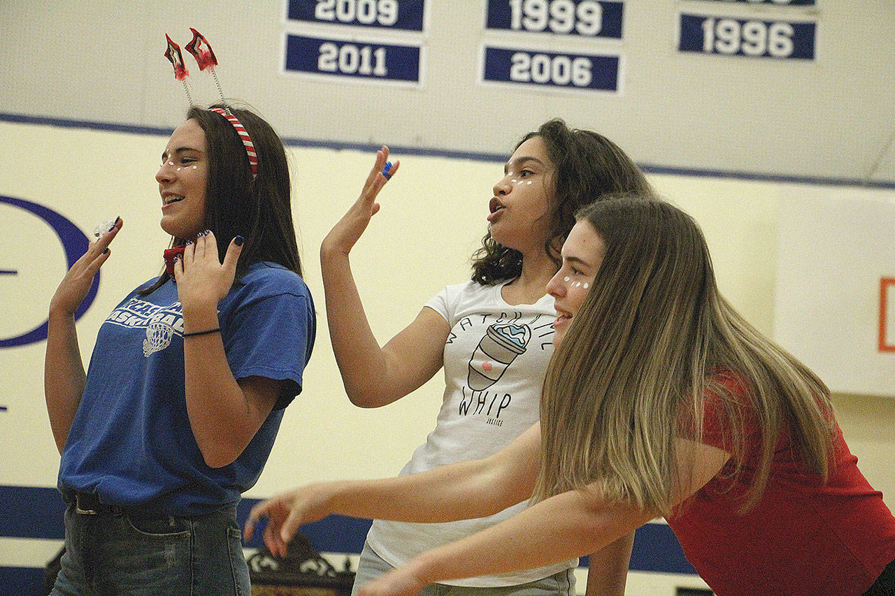 Homecoming assembly and parade photos | Soccer game and barbecue on Saturday