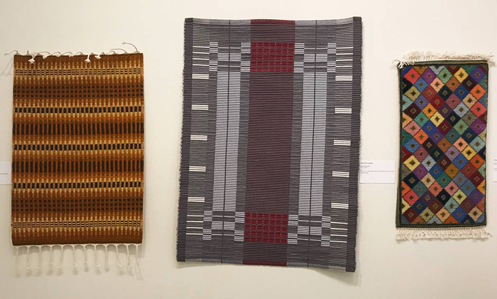 Contributed photo                                Northern Light Krokbragd weave by Jason Munkres (San Juan), Handwoven Rug by Hannah Boehm (Orcas) and Bench Rug woven/Ghiordes knots by Jean Henson (Orcas).