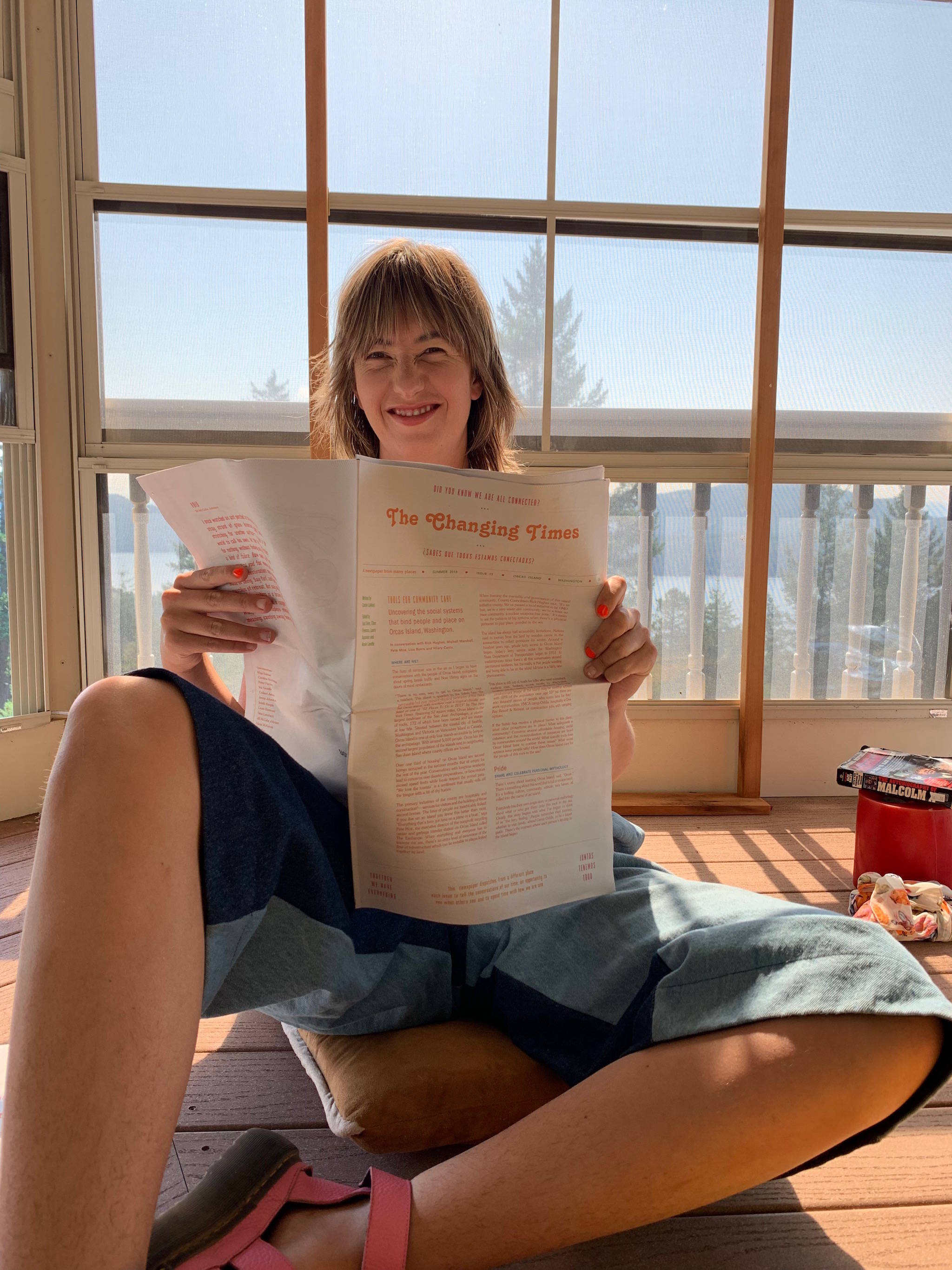 The Changing Times publisher and designer Corbin LaMont with Issue 13: Orcas Island, Washington