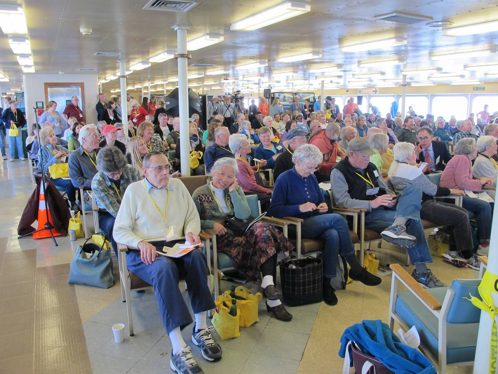 More than a hundred people gather in close proximity for the annual meeting aboard Washington State Ferries each spring as is evidenced by this file photo from 2016. (file photo)