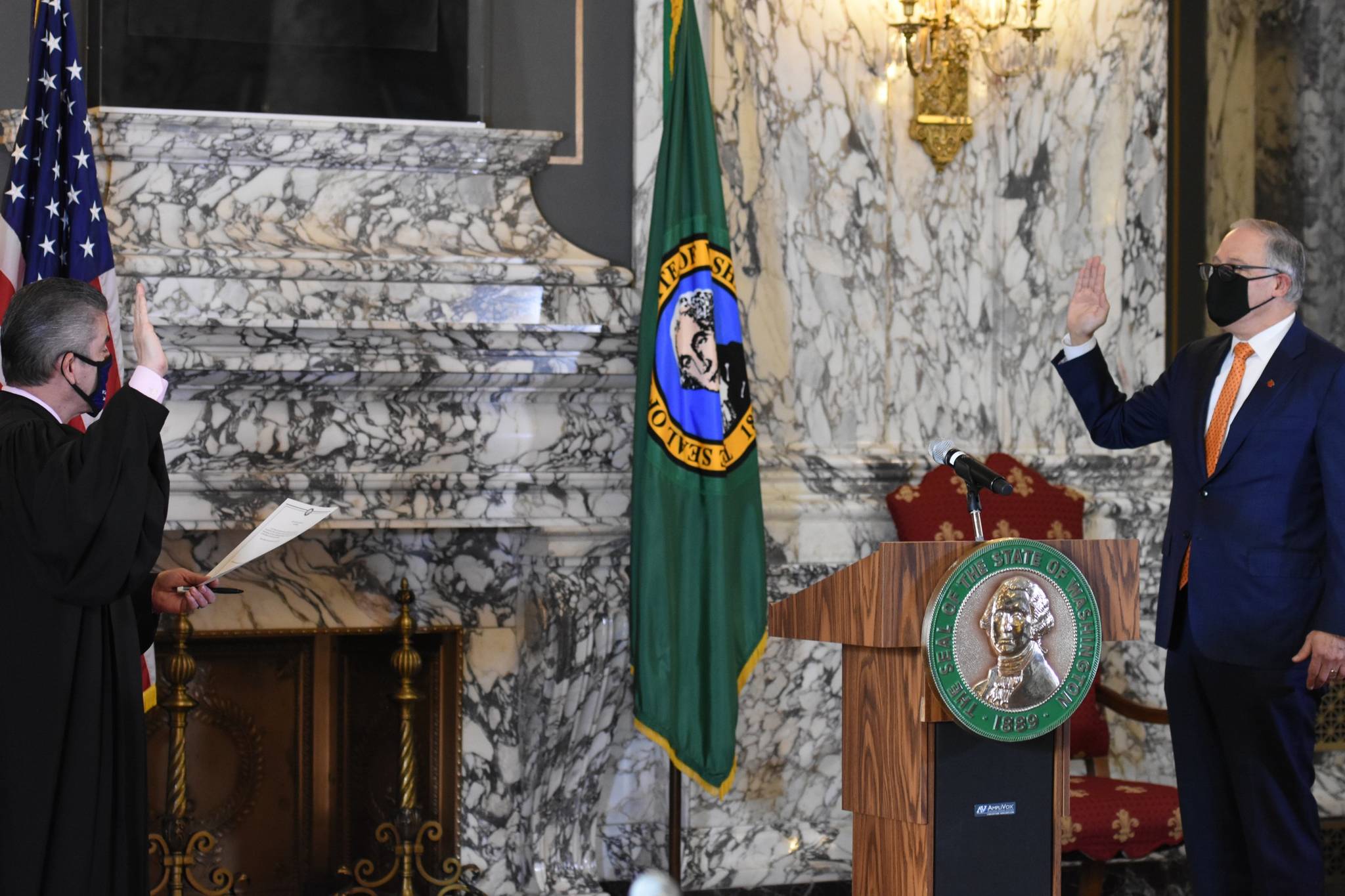 Gov. Jay Inslee being sworn in for his third term with Chief Justice Steven González.. (Gov. Jay Inslees Office/Contibuted photo)