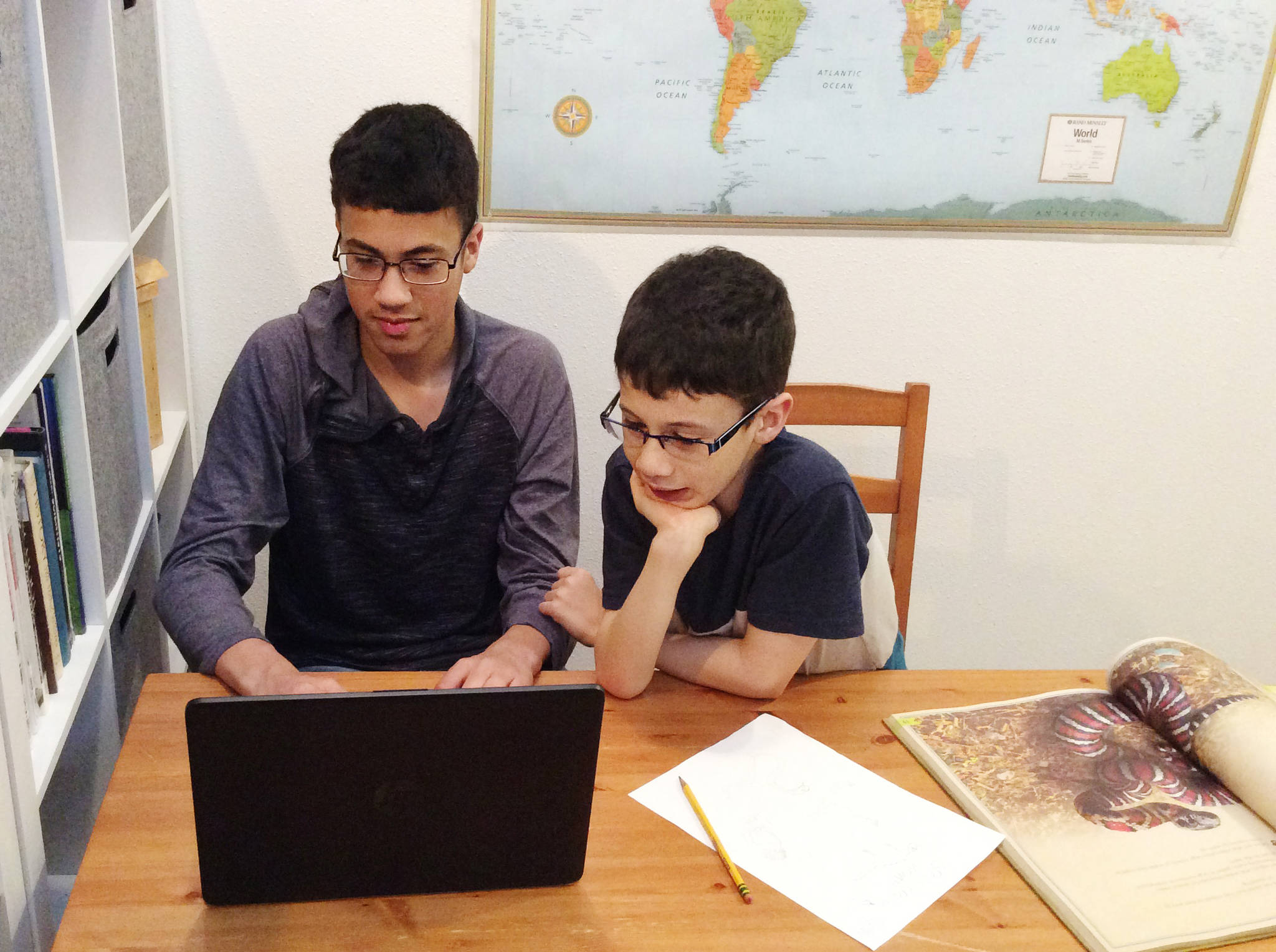 Contributed photo
Twelve-year-old Gabriel and nine-year-old Ian Malone explore the world from home.