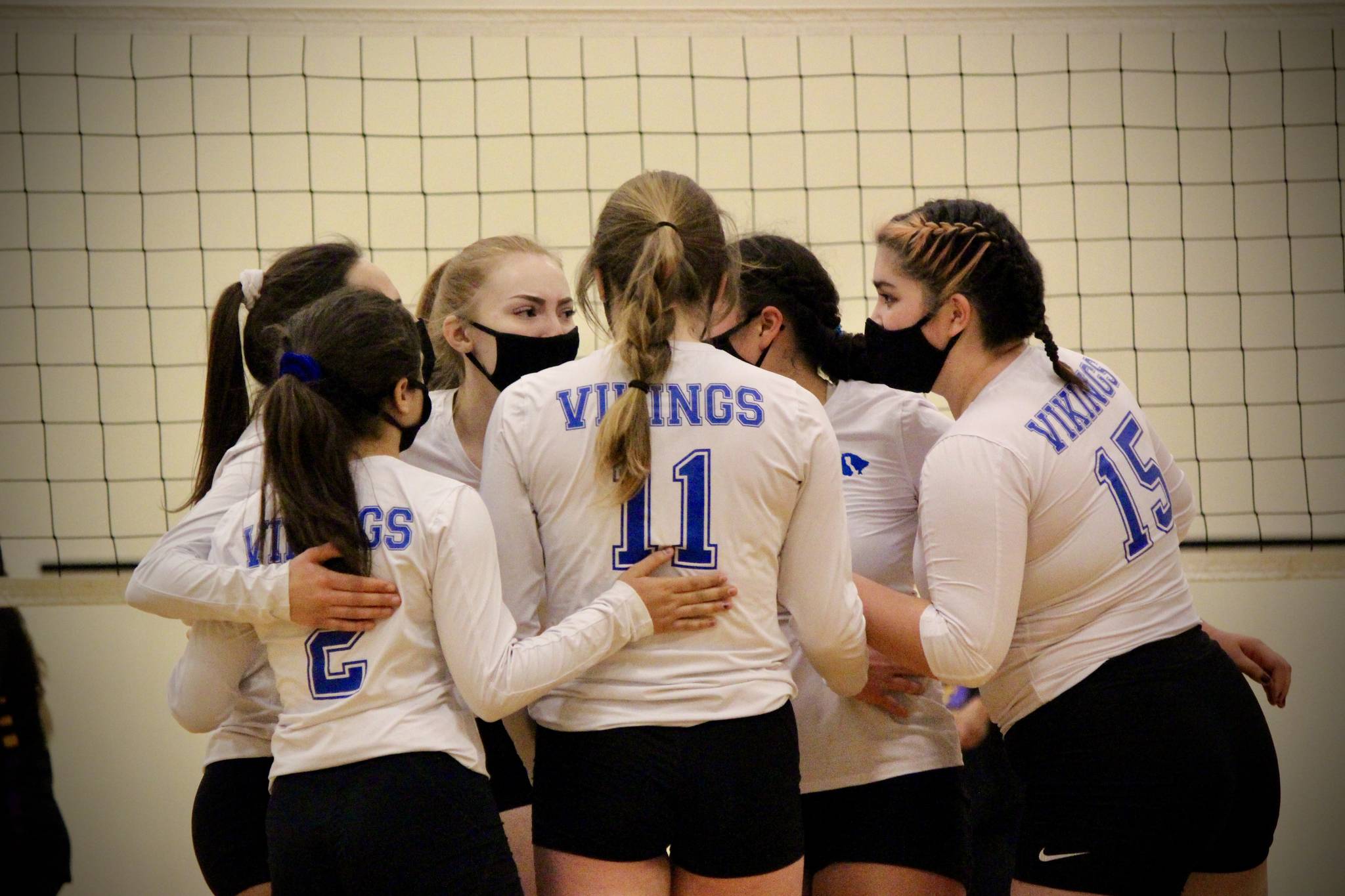 Corey Wiscomb photo
The Lady Vikings volleyball team in a huddle.