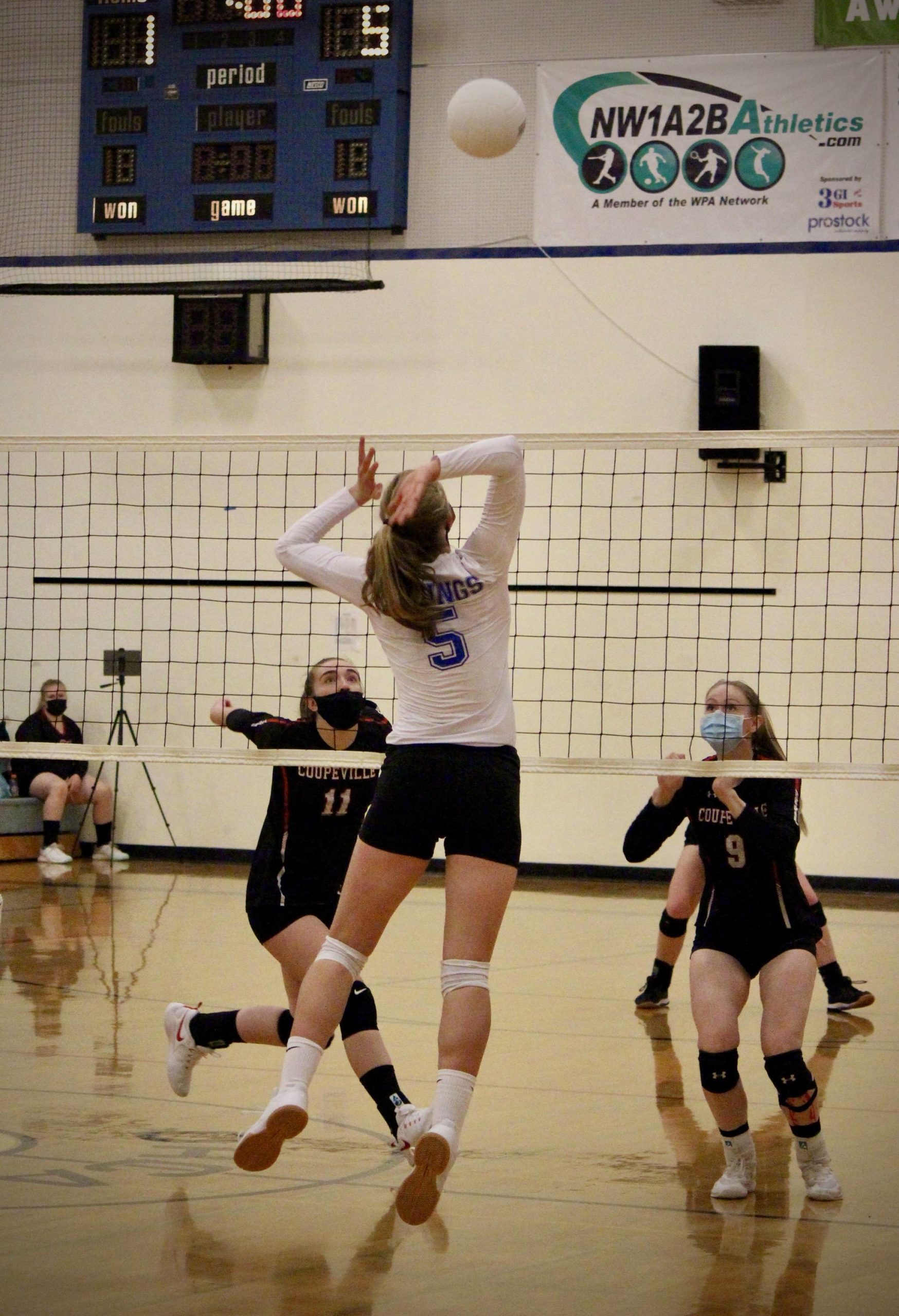 Corey Wiscomb/contributed photo
Freshman Bethany Carter elevates for a spike against Coupeville.