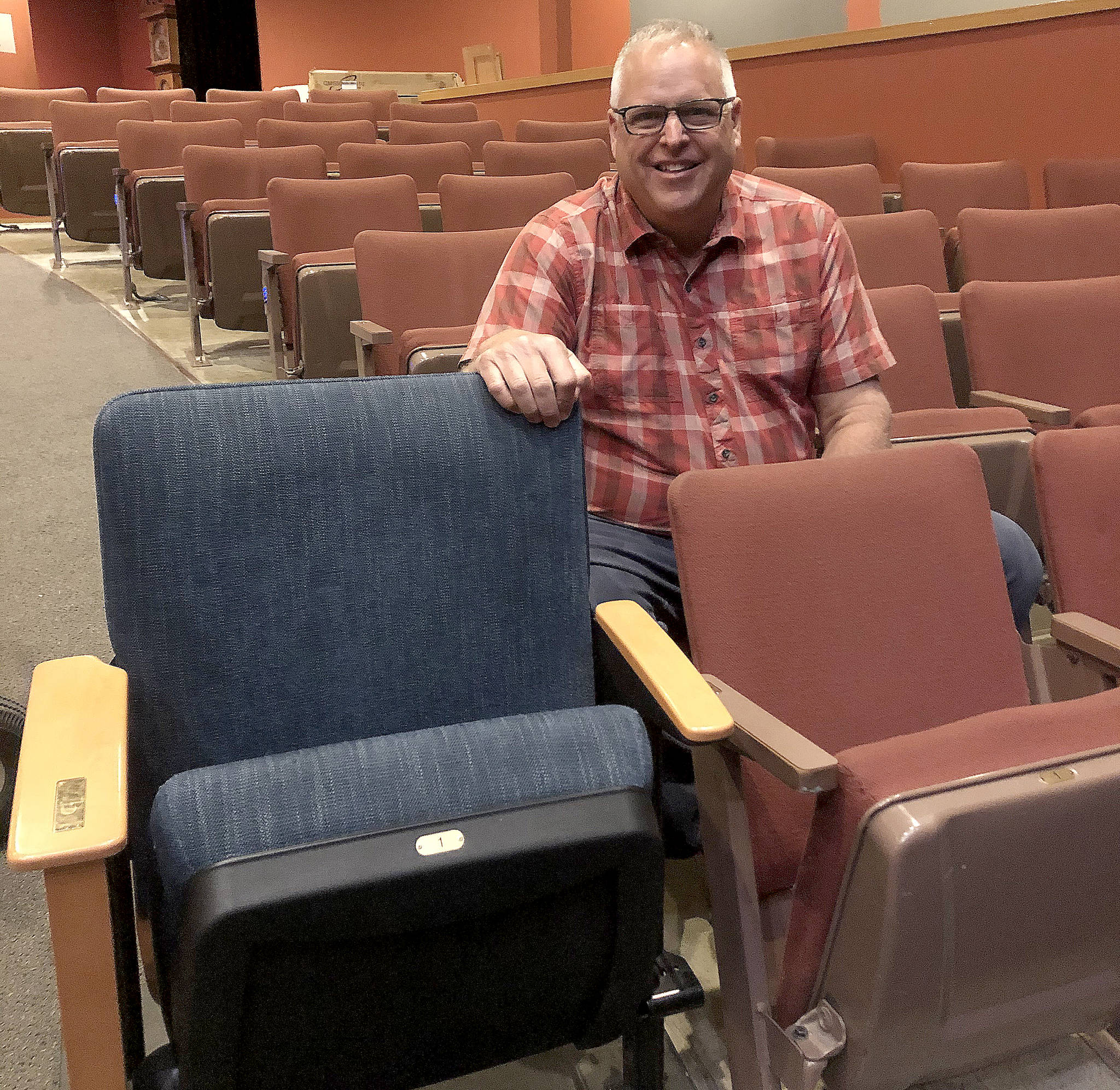 Colleen Smith/staff photo
Orcas Center Executive Director Dimitri Stankevich with one of the new chairs.