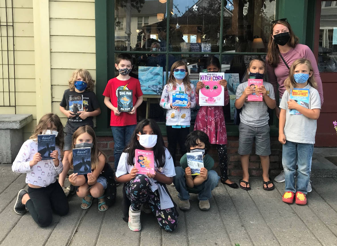 Contributed photo
Teacher Alexis Nigretto with summer reading students outside of Darvill’s Bookstore in Eastsound.