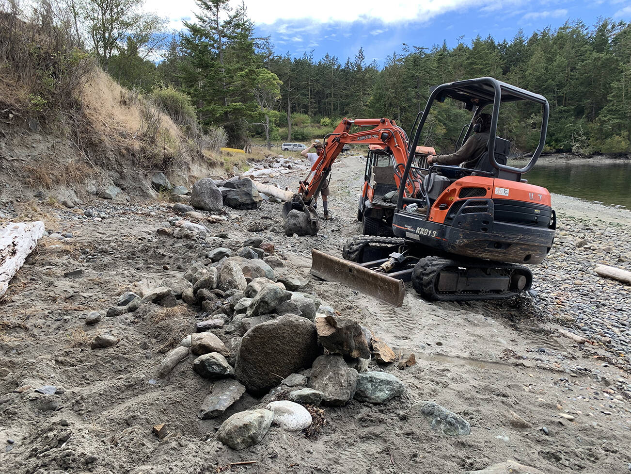 NWC removes unnecessary rock armor from upper beach habitat at Salmon Point community beach. (Contributed photo)
