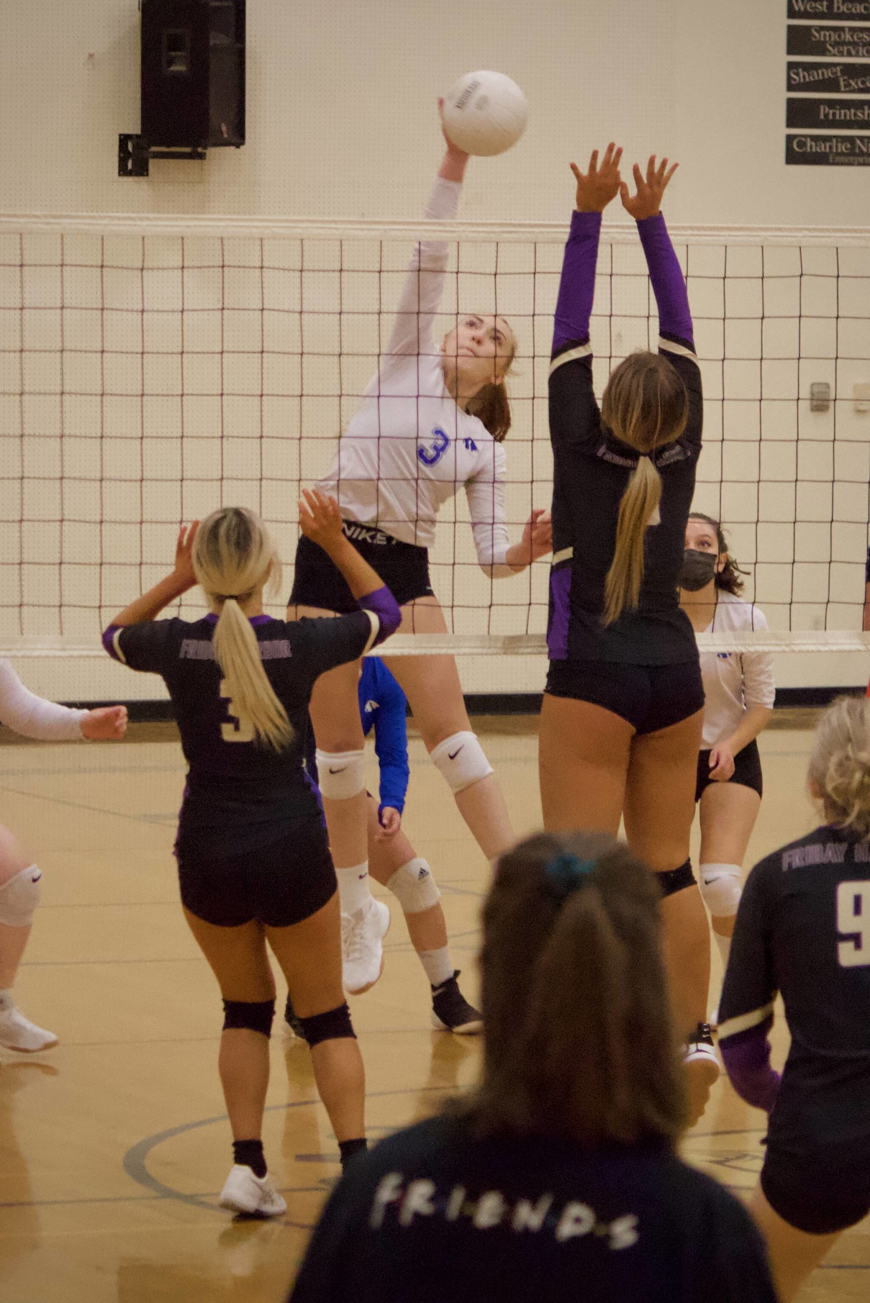Corey Wiscomb photo
Senior Alecia Talbott really upped her game this week, becoming a solid presence at the net and supporting her team with consistent hitting. She is pictured here with a kill against Friday Harbor.