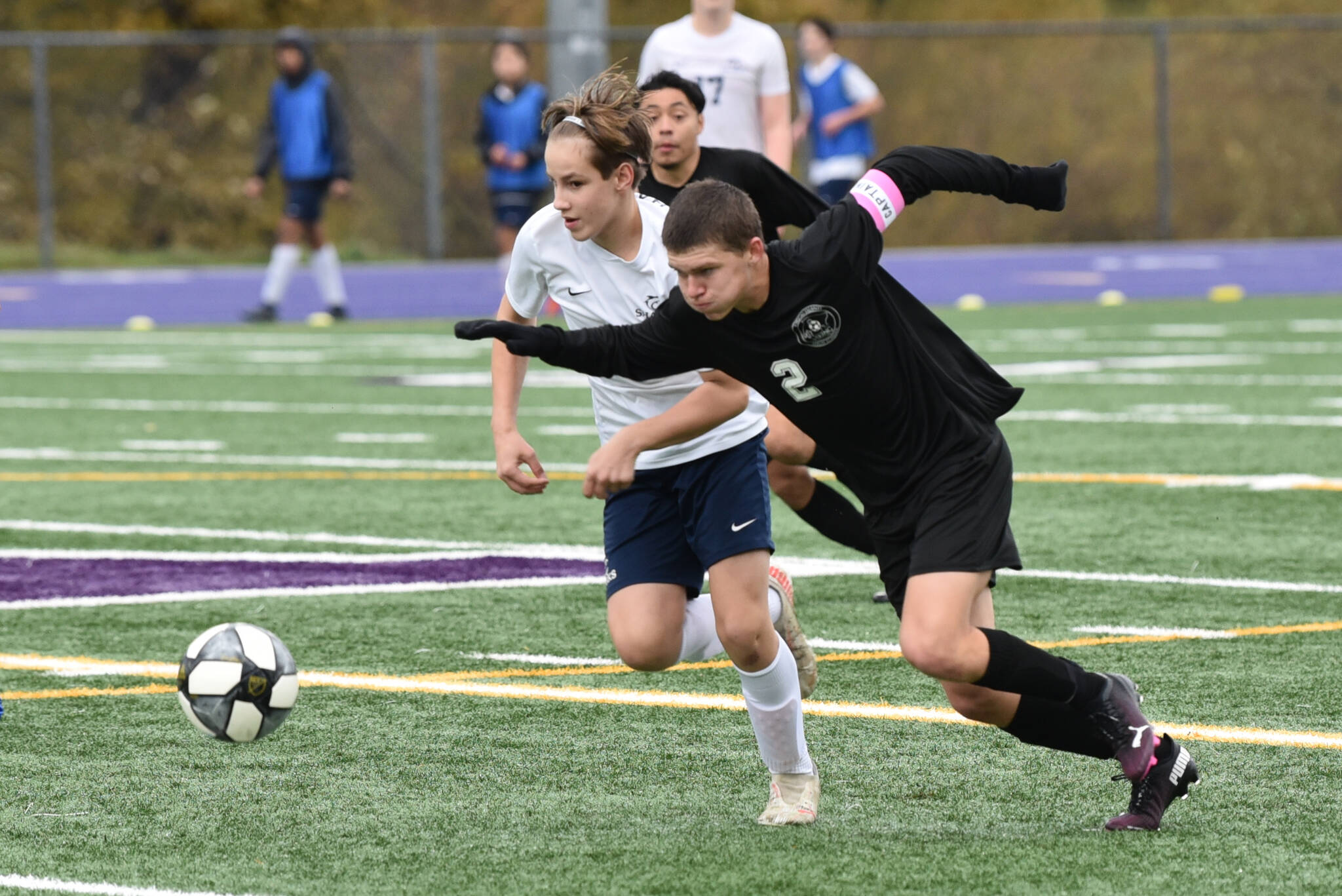 Chris Sutton photo
Junior Co-captain Tommy Anderson-Cleveland breaks hard on the ball to gain possession for the Vikings in the 5-0 routing of Puget Sound Adventist in the Elite 8 State State Playoff game.