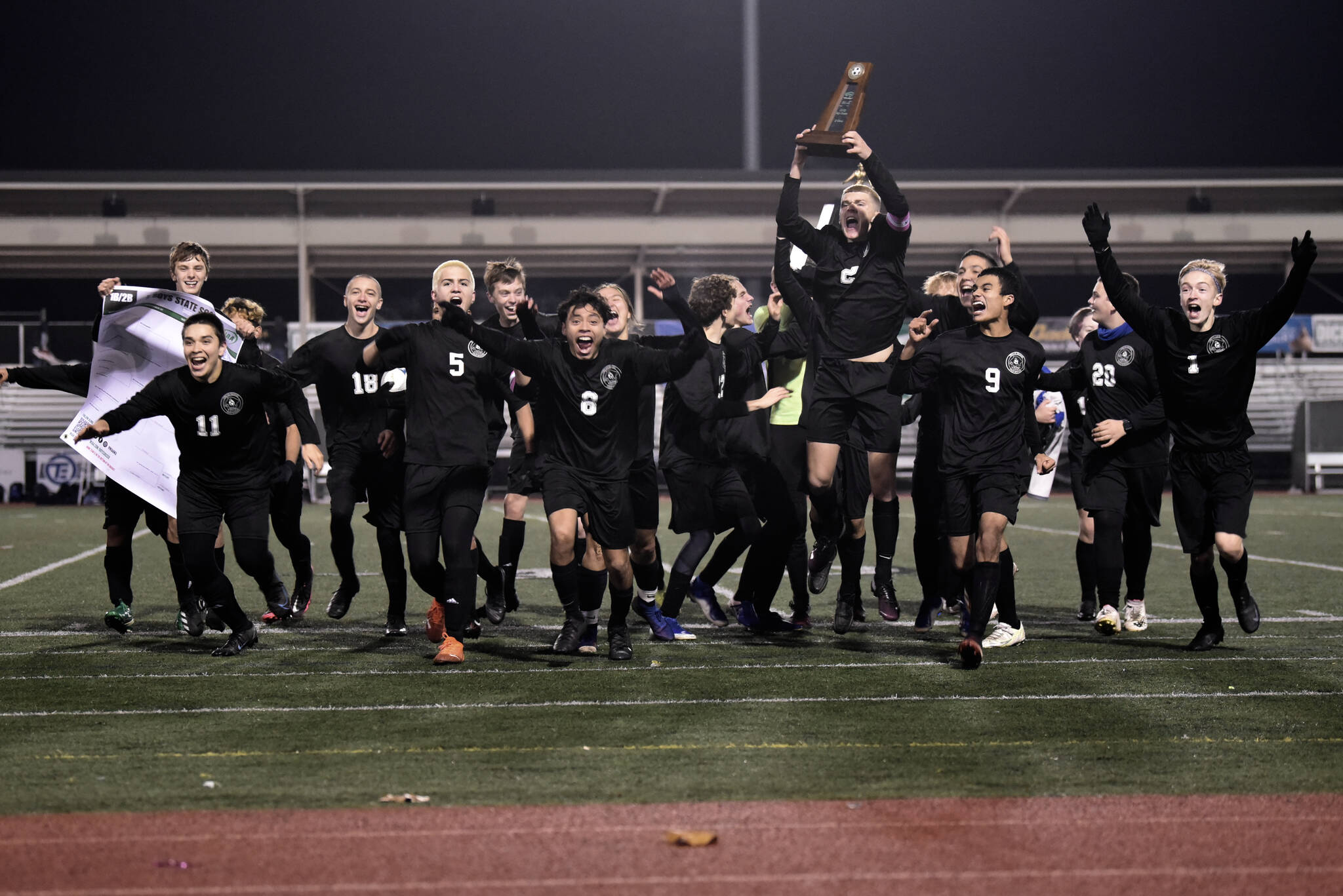 Chris Sutton photo
The Orcas Vikings soccer team with the state championship trophy on Saturday, Nov. 20. It was a tense final game against Providence that went into overtime.