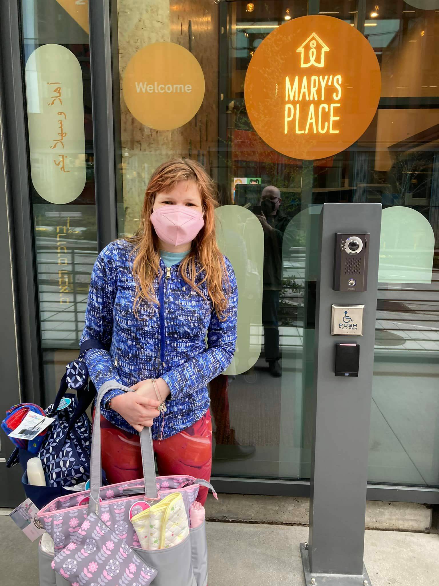 Erin White at Marys Place when she dropped off her first donations.