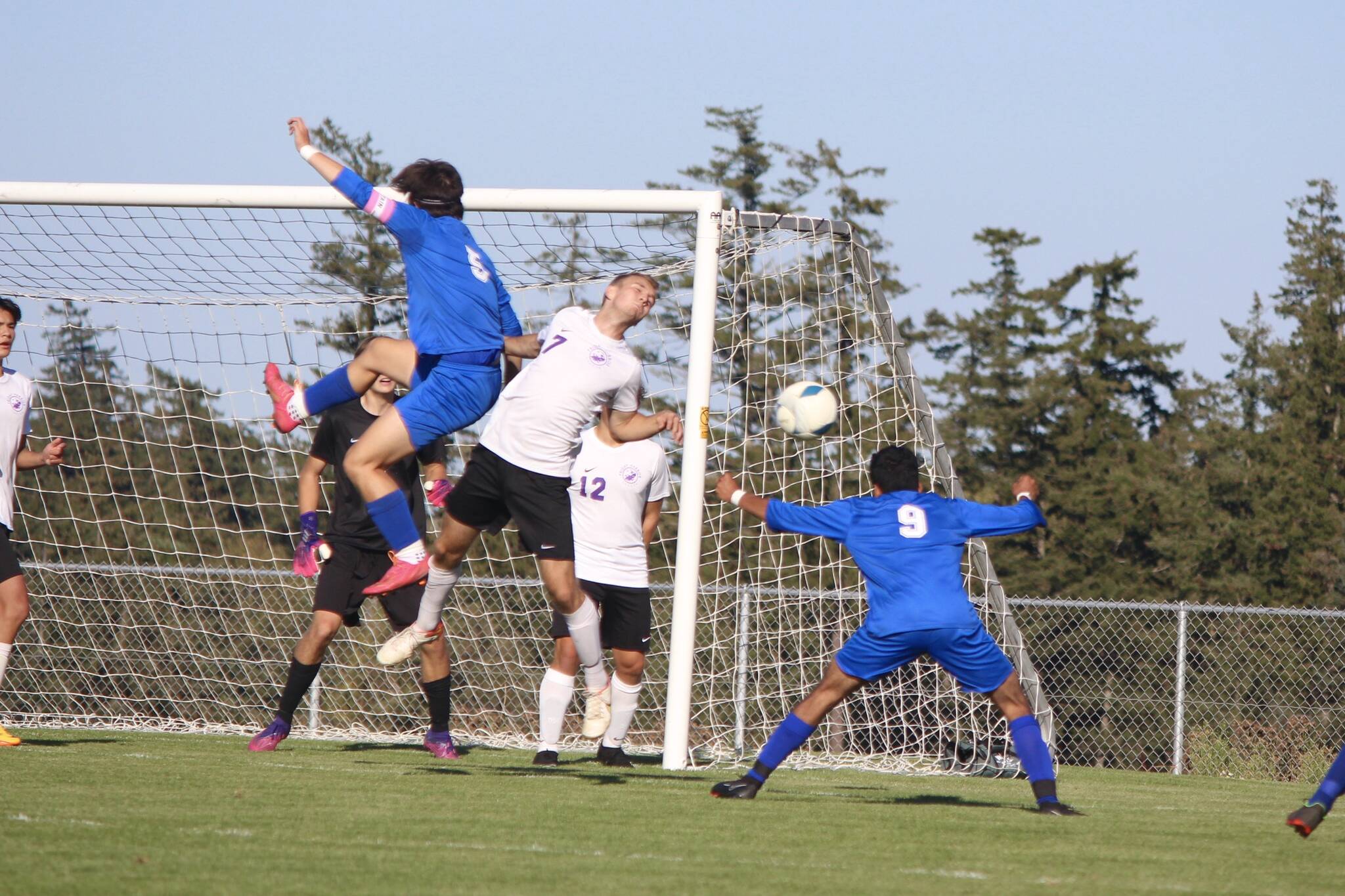 Contributed photo by Corey Wiscomb
Woverines attempt a goal.
Corey Wiscomb photo
From the corner kick Diego Lago floats high attempting to make a play on the ball while senior Pedro Guerra Banderas meets the trajectory of the ball with an aimed header at the FH goal.