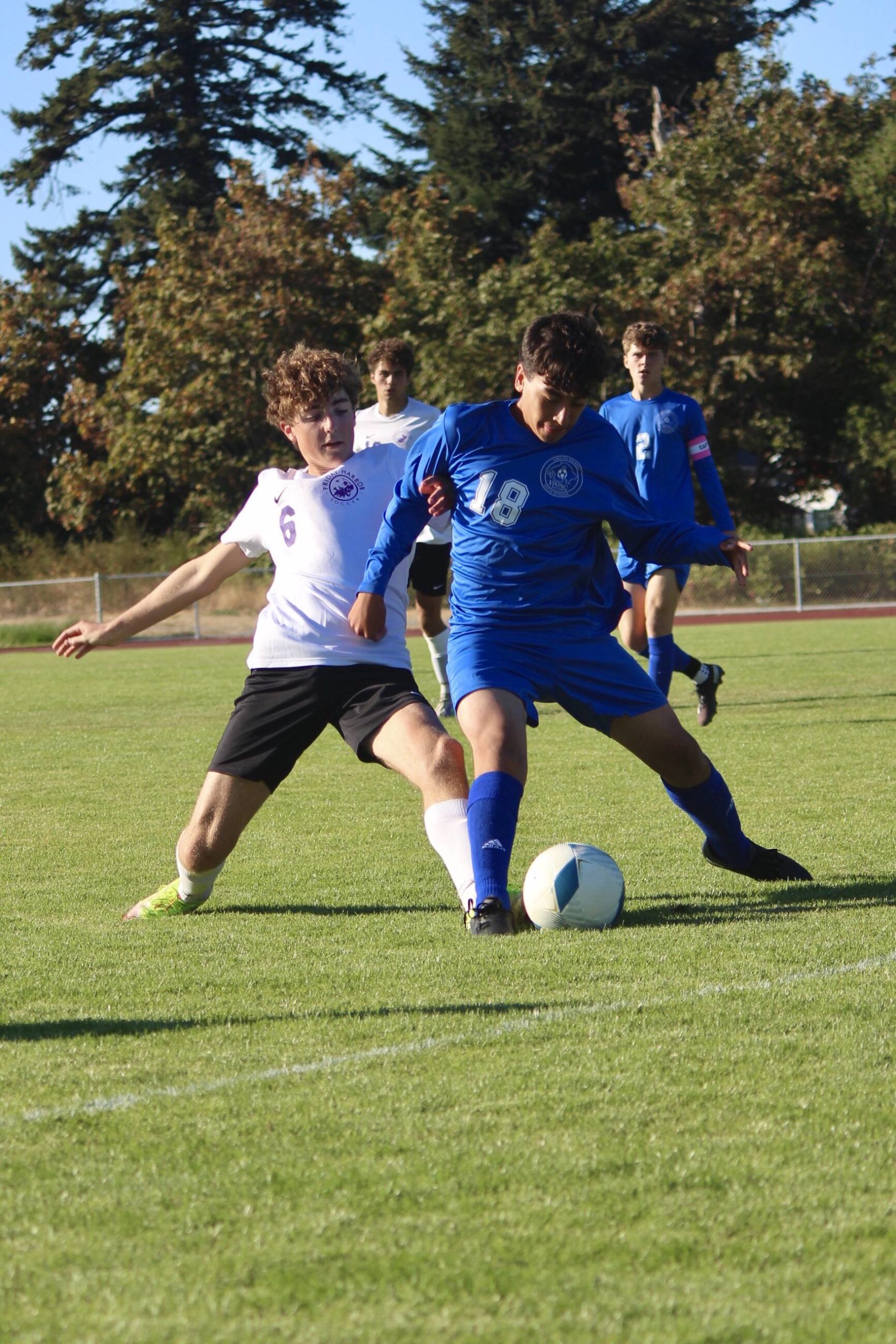 Corey Wiscomb photo
Freshman Joaquin Shanks Morales battles for position. The freshman has proved himself as a dependable role player for the Vikings. Morales had a fabulous shot on goal in the overtime period that was barely stopped by the Friday Harbor Keeper.