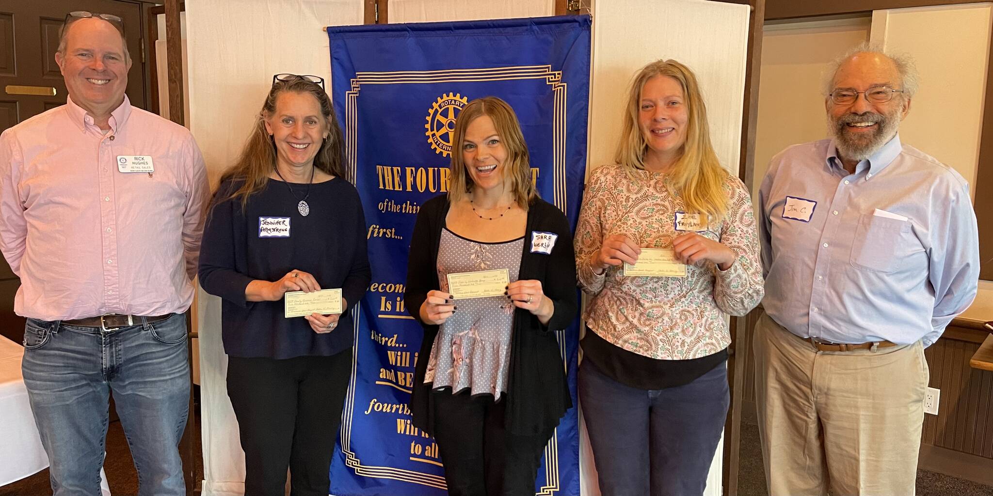 Contributed photo by the Rotary Club of San Juan Islands 
Left to right: Rotary President, Rick Hughes; Jennifer Armstrong, Joyce L. Sobel Family Resource Center; Sara Werling, Family Umbrella Group; Zoe Froyland, Mobile Dental Van; Jim Corenman, The Sports Car Club of San Juan Islands.