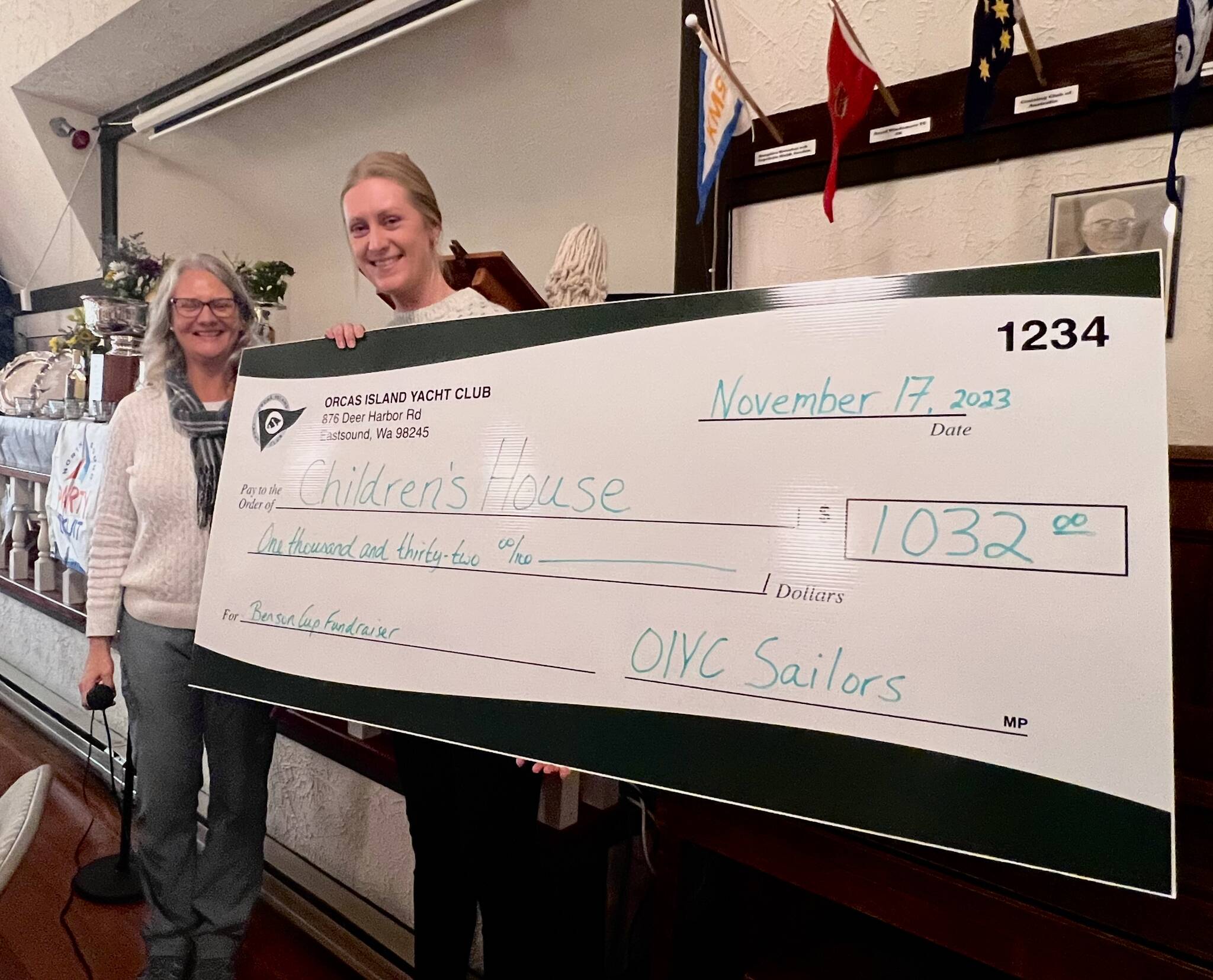 Contributed photo
Orcas Island Yacht Club’s Stephanie Arnold presents a check to Mallory Ballome, Board Member of the Children’s House.