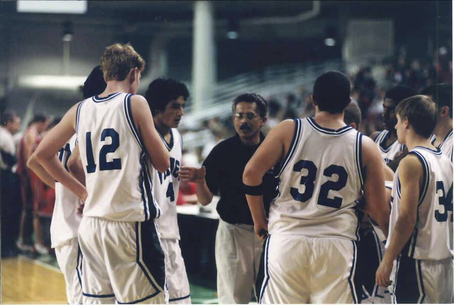 Coach Sasan leads his team in the 2002 double overtime thriller tri-district championship game against Seattle Christian.