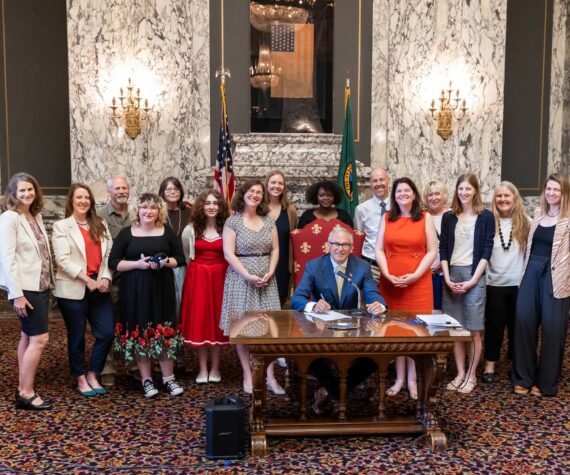 <p>Contributed photo</p>
                                <p>Gov. Jay Inslee signs new protections into law.</p>